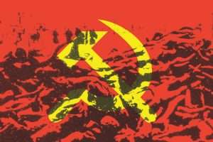Yellow hammer and sickle on red background