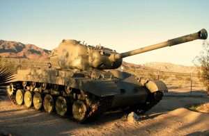 A large tank in a field.