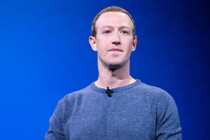 Mark Zuckerberg speaking on a stage.