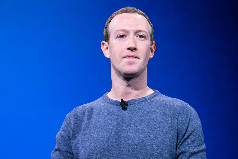 Mark Zuckerberg speaking on a stage.